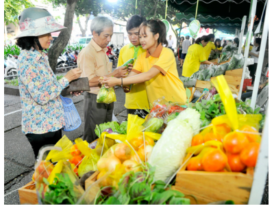 Farm produce fair organized to sell safe vegetables, fruits