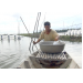 Vietnamese farmers mix salt with water to raise shrimp